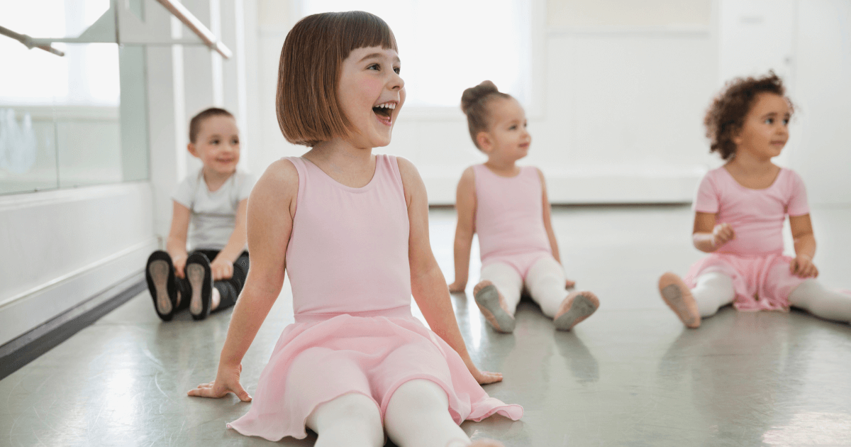 Kids having a ballet lesson.
